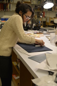 Our pre-program intern, Catarina, covering one of her cradle arms in navy Cialux. 