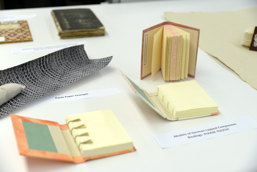 Book models and examples of paste paper.